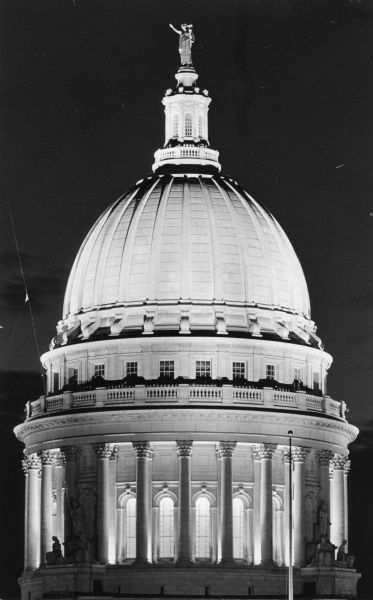 Night view of the Wisconsin State Capitol dome, which is the only granite dome in the United States. It is made with white Bethel Vermont granite and cost over $203,836.00.