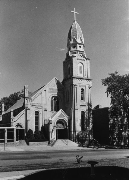 Exterior view of St. Patrick's Catholic Church at 410 East Main Street which was dedicated on March 17, 1889. The church was designed by T.C. McCarthy and an addition was built in 1903.