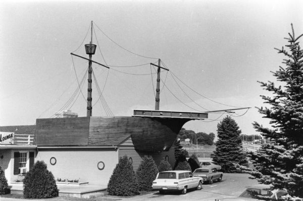 Exterior view of the Mayflower Motel at 2500 Perry Street, which was remodeled by Charles Kennedy and Duane Millard to look like the Mayflower ship.