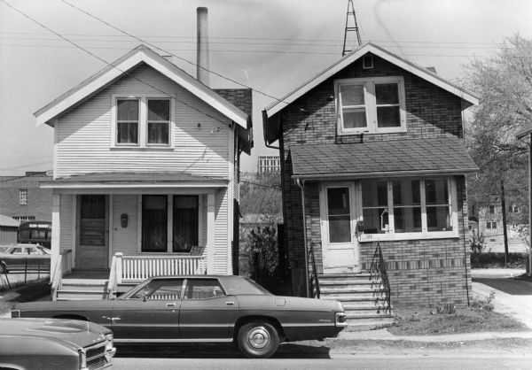Two houses at 1112 and 1114 Regent Street, both of which lean to one side.