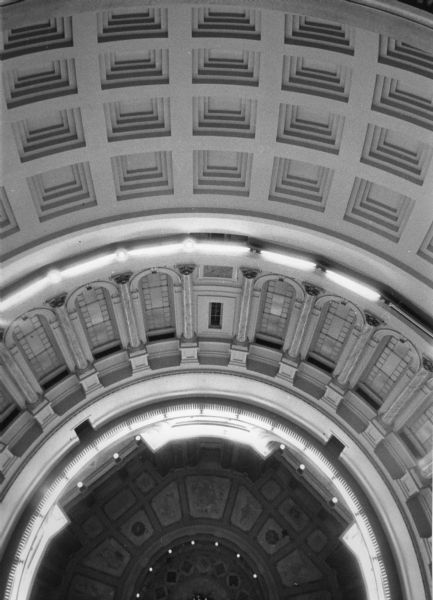 Ceiling of the Wisconsin State Capitol dome interior showing decorative carving.