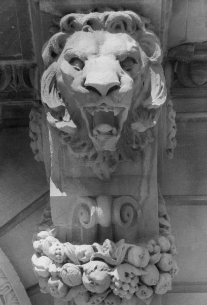 Stone lion's head which serves as a decorative detail on the exterior of the Wisconsin Historical Society.