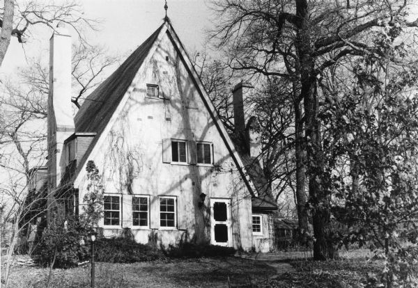 The design of the "Storybook House" at 2114 Van Hise Avenue, was inspired by fairytale drawings and French Norman architecture. The house was built of hollow baked tiles and covered with rough plaster in 1920.