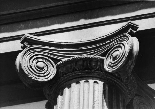 One of four Ionic-style columns on the Greek revival Brown house at 116 East Gorham Street.