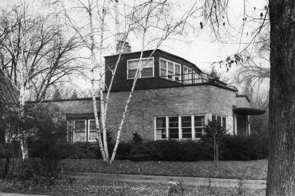 Exterior view of 1130 Shorewood Boulevard, built in 1935 it was known as the "steamboat-round-the-bend" because the second story gives the appearance of a bridge on a boat.