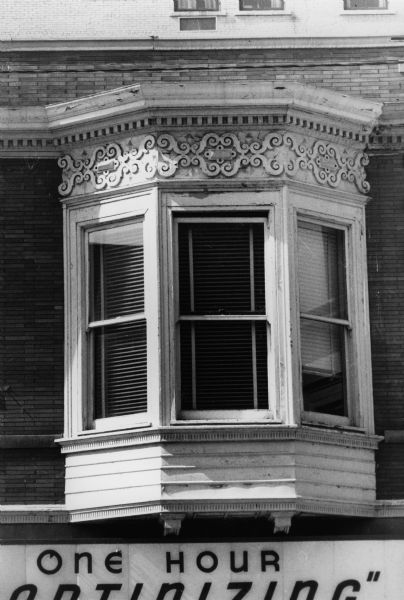 Ornate oriel window on a building at 10 South Carroll Street.