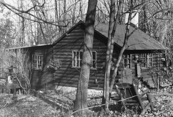 Exterior view of a log cabin home at 3506 Lake Mendota Drive.