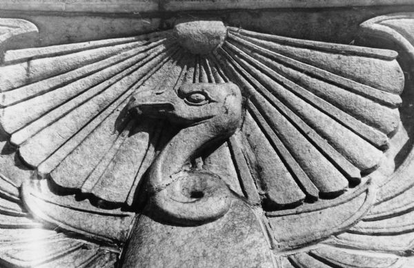 Carved bird in Egyptian Revival design above the entrance to the Levitan Building at 15 West Main Street.