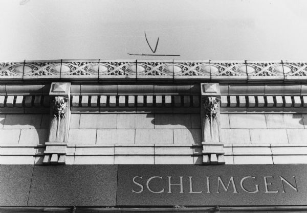 Decorative terra cotta details on the exterior front of the Schlimgen Building at 1327 University Avenue.