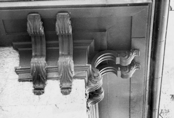 Detail showing projecting brackets, known as corbels, on a building at 2709 Sommers Avenue. Corbels reflect an Italianate Gothic style more commonly associated with cathedrals.