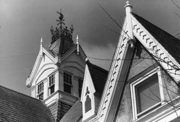 The rooftop of a house at 753 East Gorham Street reflecting the Gothic revival style in its extensive use of glass, vaults, and pointed arches.