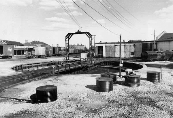 A railroad turntable at the Milwaukee Road railroad yard off West Washington Avenue.