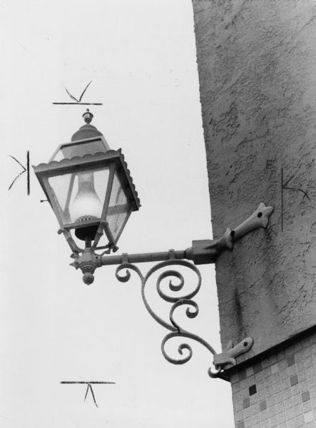 A decorative lamp on the outside of Lombardino's restaurant located at 2500 University Avenue.