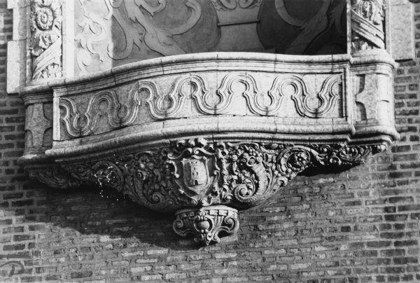 Ornate Spanish Baroque detail at the base of a niche high up on the face of the Capitol Theatre (Madison Museum of Contemporary Art) 213 State Street. Details include oak leaves, rosettes, and cornucopias.