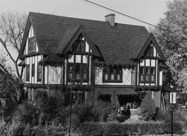 The William Pence House at 168 North Prospect Avenue, which displays English Tudor architecture in its steep angles and a half-timber framing.