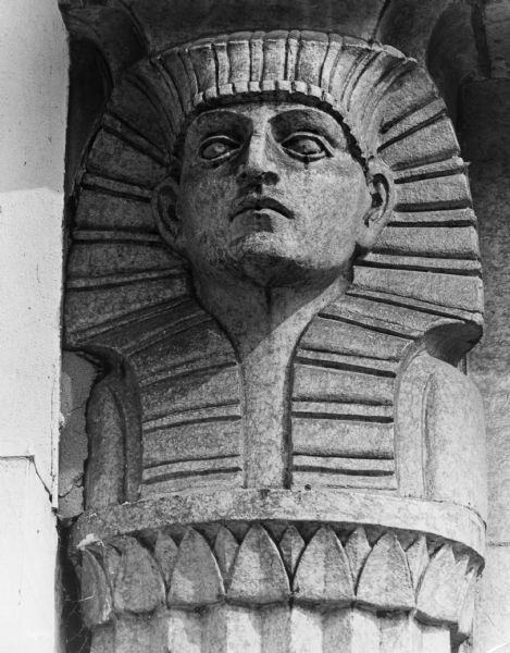 A carved Eyptian bust which adorned the Levitan building at 15 West Main Street before it was razed.