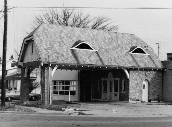 Triangle Super Service gas station, 635 South Spooner Street at the corner of Monroe Street. It was demolished so that Randall Bank could be built on the site.