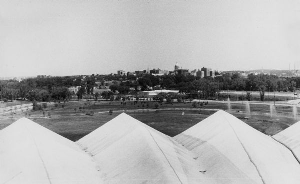 View from the roof of the Dane County Coliseum of the Madison skyline, including the Wisconsin State Capitol.