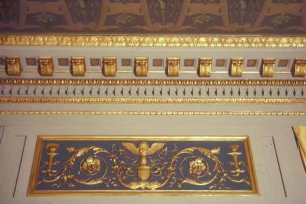 Upper wall decoration, before restoration, in the Senate Parlor of the Wisconsin State Capitol.