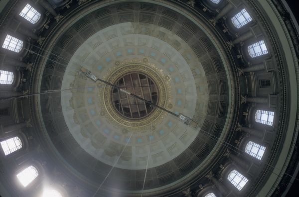 View of scaffolding used by painters in the restoration of the rotunda in the Wisconsin State Capitol.