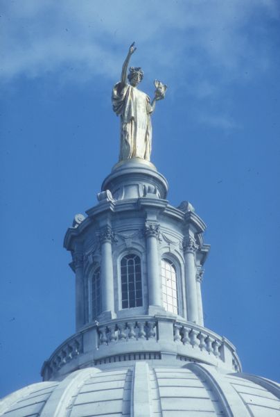 "Wisconsin" statue on top of the Wisconsin State Capitol.