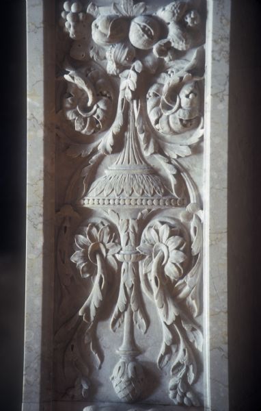 Detail of carved marble frieze in a side panel by the Governor's Conference Room fireplace in the Wisconsin State Capitol.