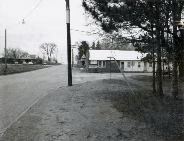 Handle's Bar and Motel, located along STH 22 in King, Wisconsin, at the intersection with Grand View Road.  Another motel can be seen in the distance across the highway.