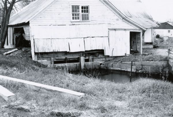 View of Austin Creek mill race as it enters the sawmill building.
