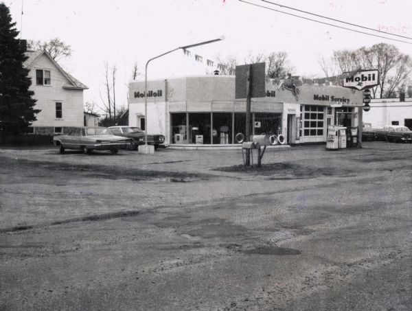 Mobil Oil service station on the corner of STH 22 and STH 21&73.