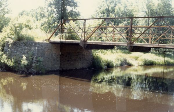 Panoramic view of the north side of the old bridge over Rocky Run in the Town of Hiles, Wood County, Wisconsin.