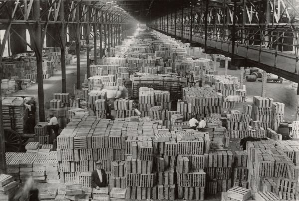 An unidentified East Coast warehouse full of food and supplies ready for shipment to the U.S. soldiers in France during World War I.