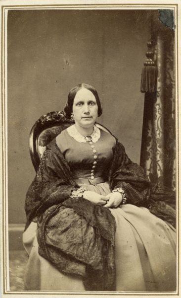 Seated carte-de-visite portrait of Esther Green Smilie Vilas (born ca. 1819), the wife of Levi B. Vilas, a prominent Madison businessman, and the mother of Senator William Freeman Vilas.
