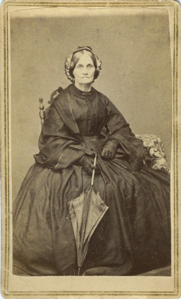 Sally Blair Fairchild, the wife of Jairus Fairchild, the first mayor of Madison, and the mother of Lucius, Cassius, Charles Fairchild, and Sarah Fairchild Dean Conover. This photograph was probably taken about 1862, the year in which her husband died, because she is wearing mourning attire.