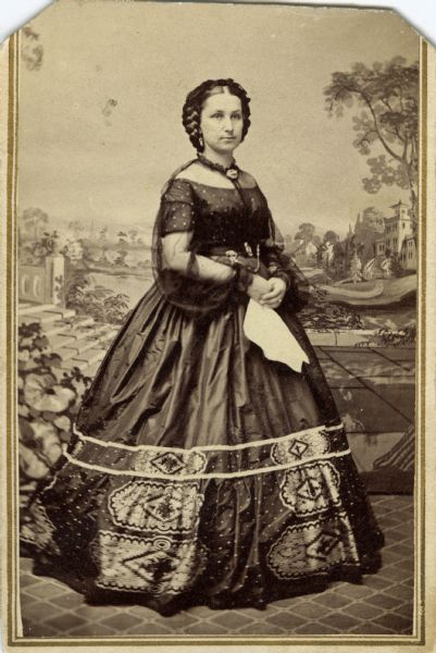Carte-de-visite portrait of Caroline Stevens Keyes, the first wife of Madison political leader Elisha W. Keyes. The couple was married in 1854 and Mrs. Keyes died in 1865. They were the parents of three children.