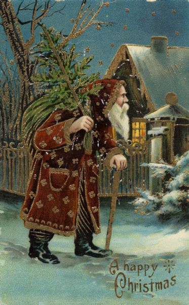 Holiday postcard with Santa Claus with a walking stick, carrying a sack and holding a Christmas tree on his shoulder. He is in front of a snow-covered house with a fence, trees and shrubs. He is wearing a brown robe and hood decorated in gold, his boots are black. The text in the lower right corner reads: "A happy Christmas". Chromolithograph, gold foil and embossed. Printed in Germany.