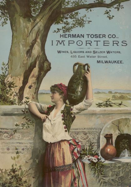 Chromolithographed advertising poster of the Herman Toser Co., of Milwaukee, importers of wines and liquors. The poster depicts a young Italian woman in traditional dress carrying a wine jug on her shoulder. This poster was part of a collection of chromolithographs collected by Claus Holst of Mischicot, Wisconsin.