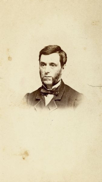 Vignetted portrait of Madison photographer, John S. Fuller.
