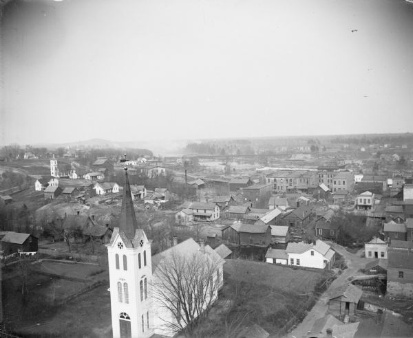 Elevated view from top of County Court House. Front center is the Evangelical Lutheran Church. Left middle is the first Roman Catholic Church with the white cross on top.
