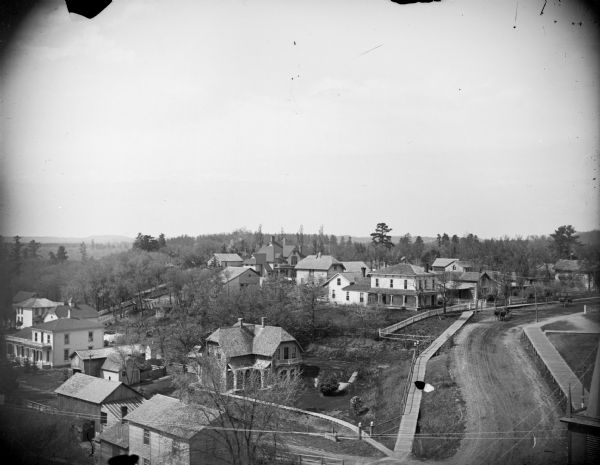 Elevated view of town with houses along Main Street.