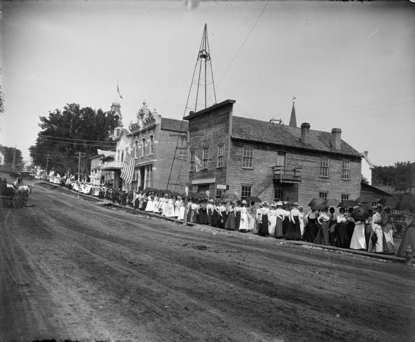 Memorial Day procession at Second and Main Streets, with the Women's Relief Corps leading the way.