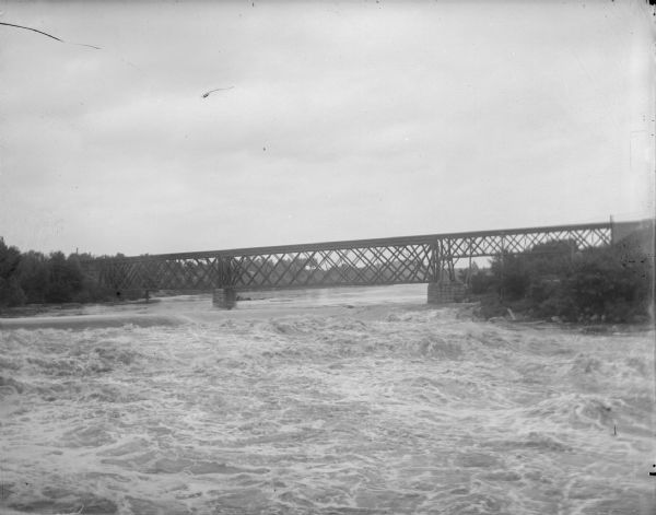 Bridge with high water underneath.