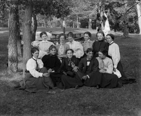 Large group of ten women posing with one man. Possibly identified in the back row, from left to right as Bessie Richards, Julia Ormsby, ? Stiell, Alta Hamilton, and Mina Werner; front row, from left to right as unidentified, unidentified, Edna Richards Turner, Lou Thompson, and unidentified.