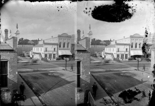 Elevated view, possibly a stereograph, of the intersection of First and Main Streets, probably taken from the window of the Van Schaick studio.