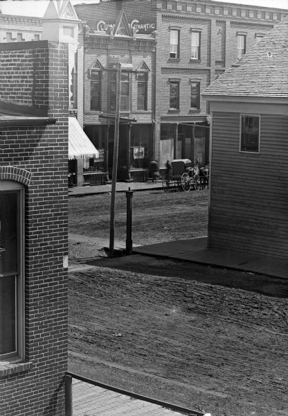 Elevated view of intersection of First and Main Streets, probably taken from the window of the Van Schaick studio.