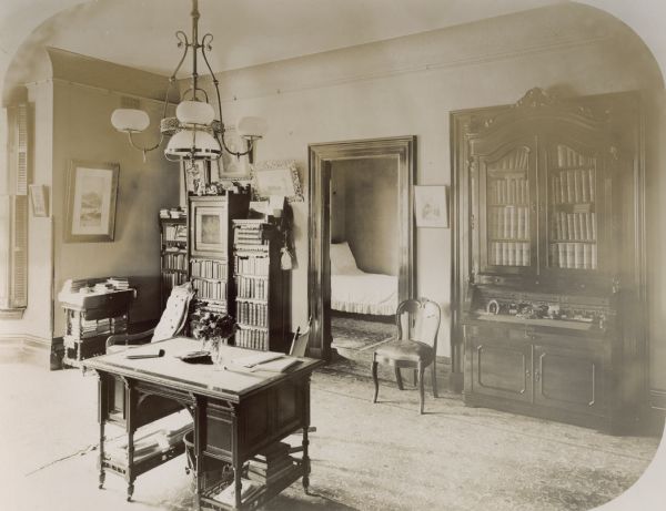 Living room and downstairs bedroom of Timothy Brown II and Elizabeth Barnard Brown's house (built 1863), 116 East Gorham Street.