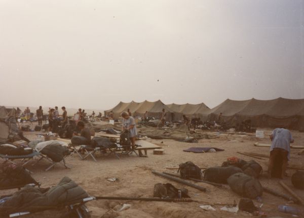 Soldiers preparing to leave Saudia Arabia the day after a wind and sand storm.