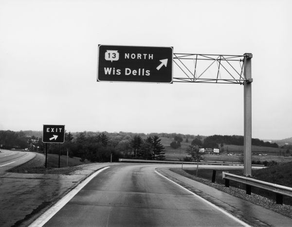 Road sign to Highway 13 and Wisconsin Dells.