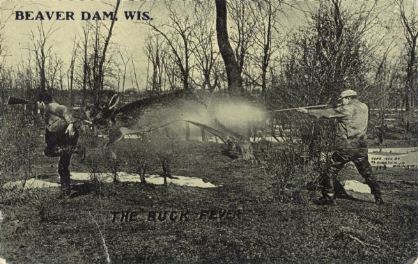 Two men are hunting with rifles in the Wisconsin woods.  It is winter; there is snow on the ground.  Instead of shooting a deer, one hunter shoots a giant rabbit with his rifle.  Text in the upper left corner bears the inscription, "Beaver Dam, Wis."