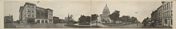Panoramic view of Capitol Square, seen from the South corner. Originally functioned as an oversized post card. Ringling Brothers Circus advertisement visible in the background.