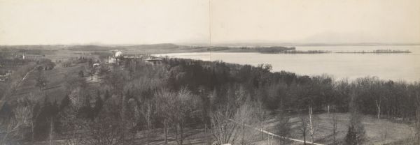 Panoramic photograph from top of Bascom Hall facing northwest, showing Picnic Point on the University of Wisconsin campus. Washburn Observatory visible to the left of Lake Mendota.